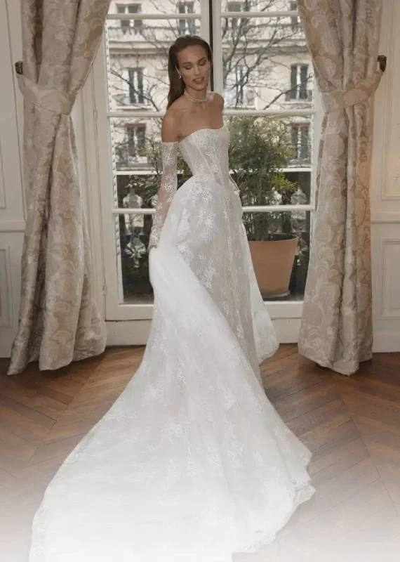 Model wearing a white Flora Gown
