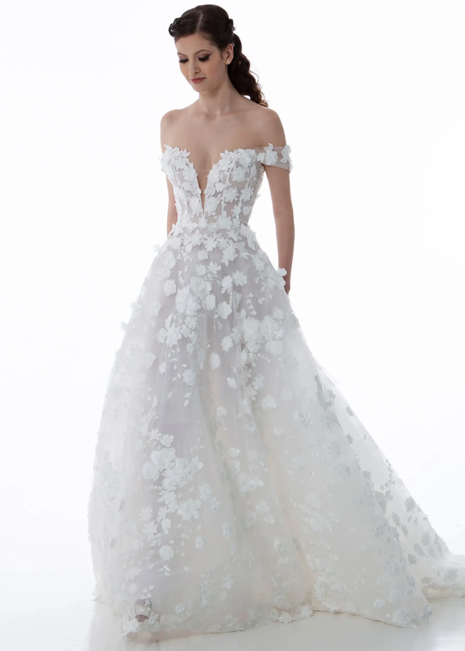 Model wearing a white Anne Barge Gown