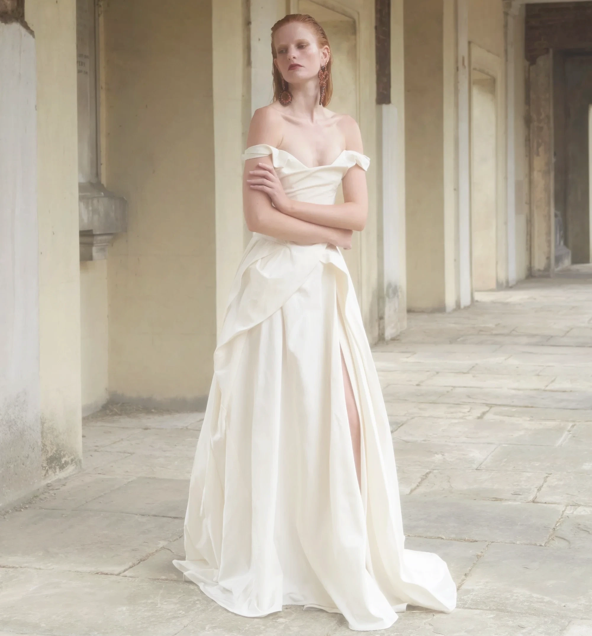 Model wearing a white a Vivienne Westwood Gown